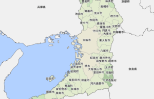 大阪市の界隈にある繁華街のミナミで暴力団幹部が雑居ビルの隙間で殺害されていた遺体